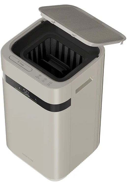 Beżowy nawilżacz z otwartą pokrywą, pokazujący wewnętrzny czarny filtr i panel sterowania z wyświetlaczem cyfrowym.