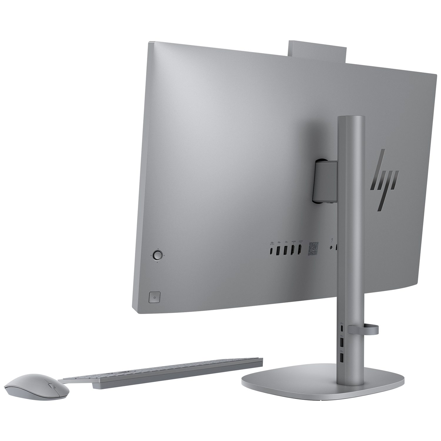 Zilveren HP all-in-one computer, toetsenbord en muis van achteren getoond.