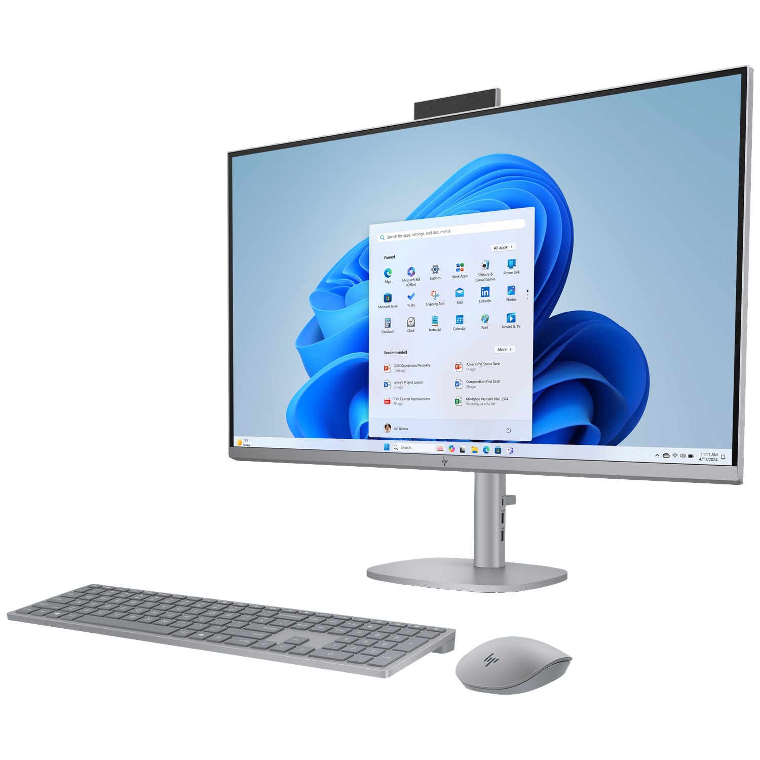 A silver HP all-in-one computer with keyboard and mouse on a white background.