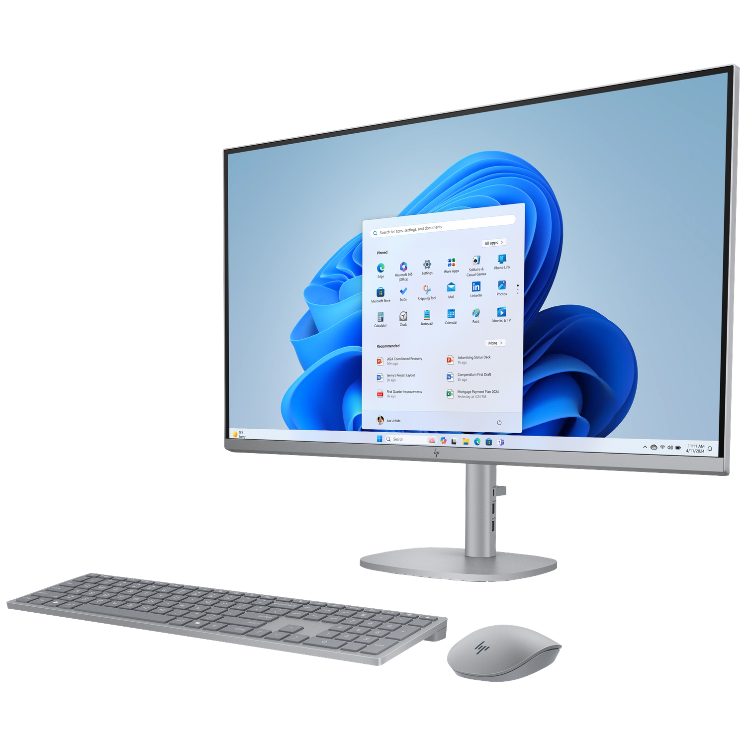 A silver HP computer setup with monitor, keyboard, and mouse.