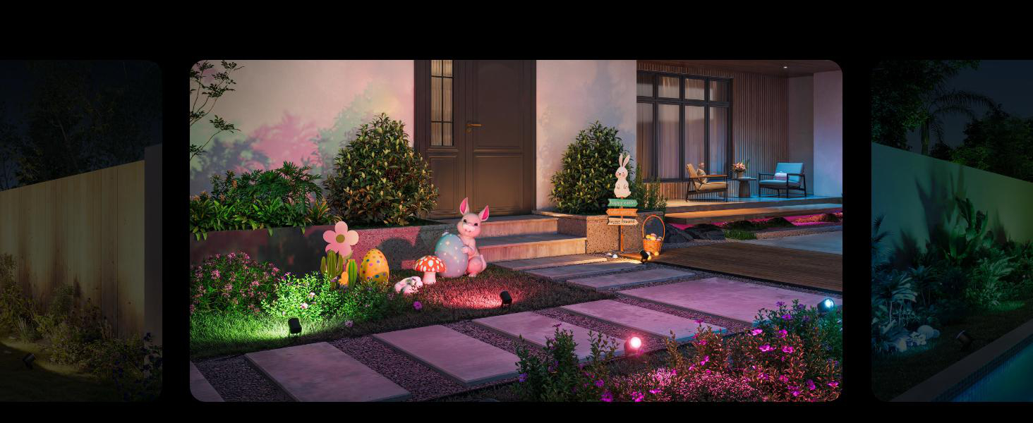 Osterdekoration mit Hase, Eiern und Blumen bei Nacht, beleuchtet von bunten Lichtern.