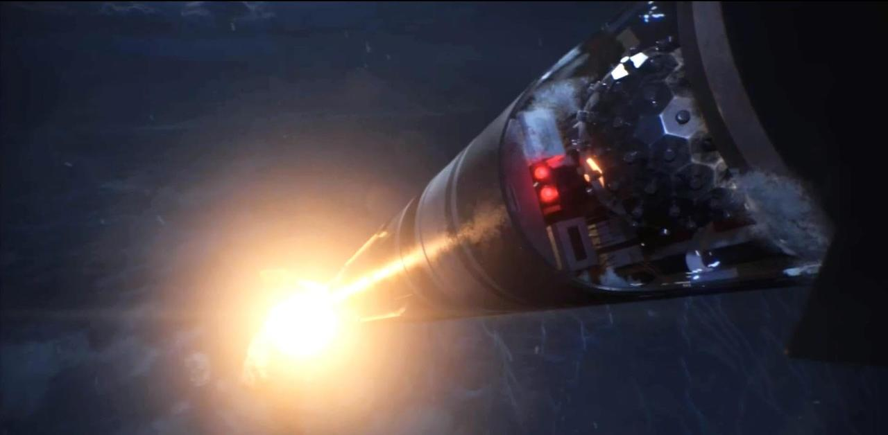 Ein Raketenantrieb entzündet sich und stößt helles Licht und Rauch aus.