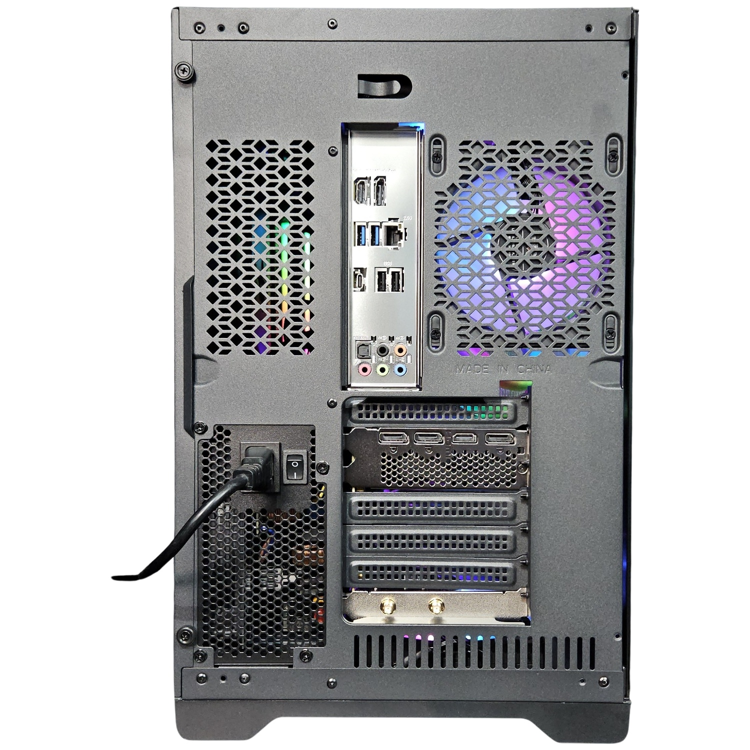 Back of a computer tower showing ports, fans with RGB lighting, and a power cord.