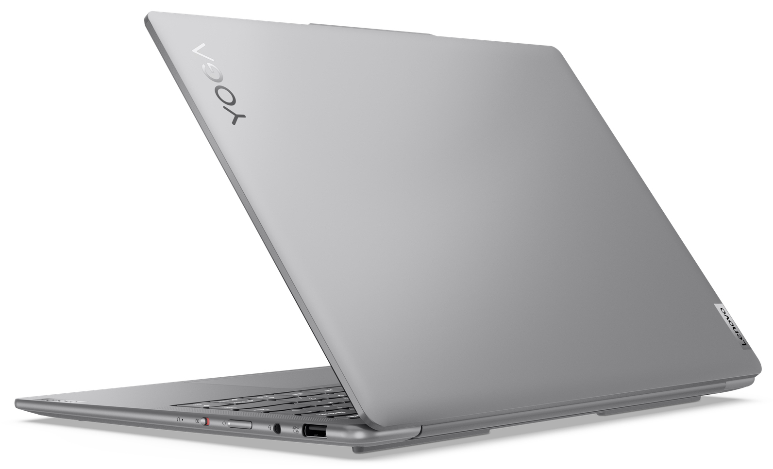 Ordinateur portable Lenovo Yoga argenté, ouvert, montrant clavier et ports. Fond blanc.