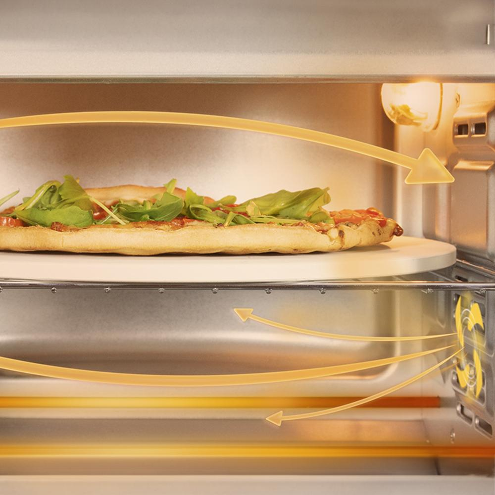 Una pizza se cocina sobre una piedra en un horno moderno con flechas amarillas que muestran la circulación del calor.