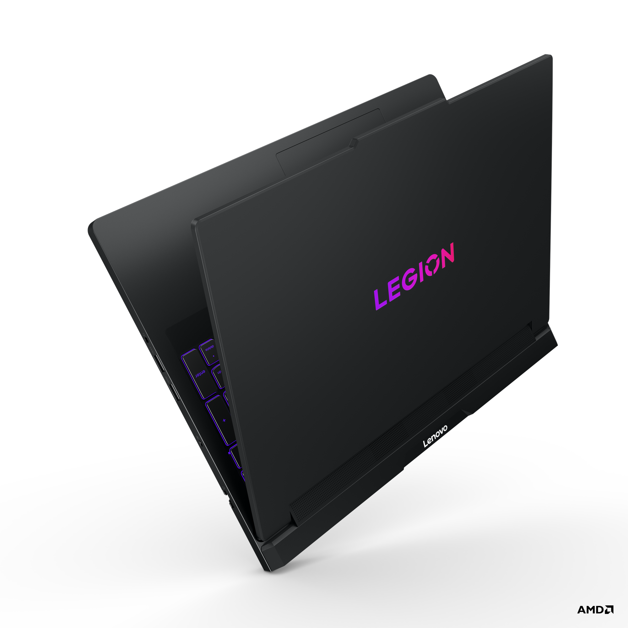Siyah Lenovo Legion dizüstü bilgisayar, aydınlatmalı klavye ve logo.