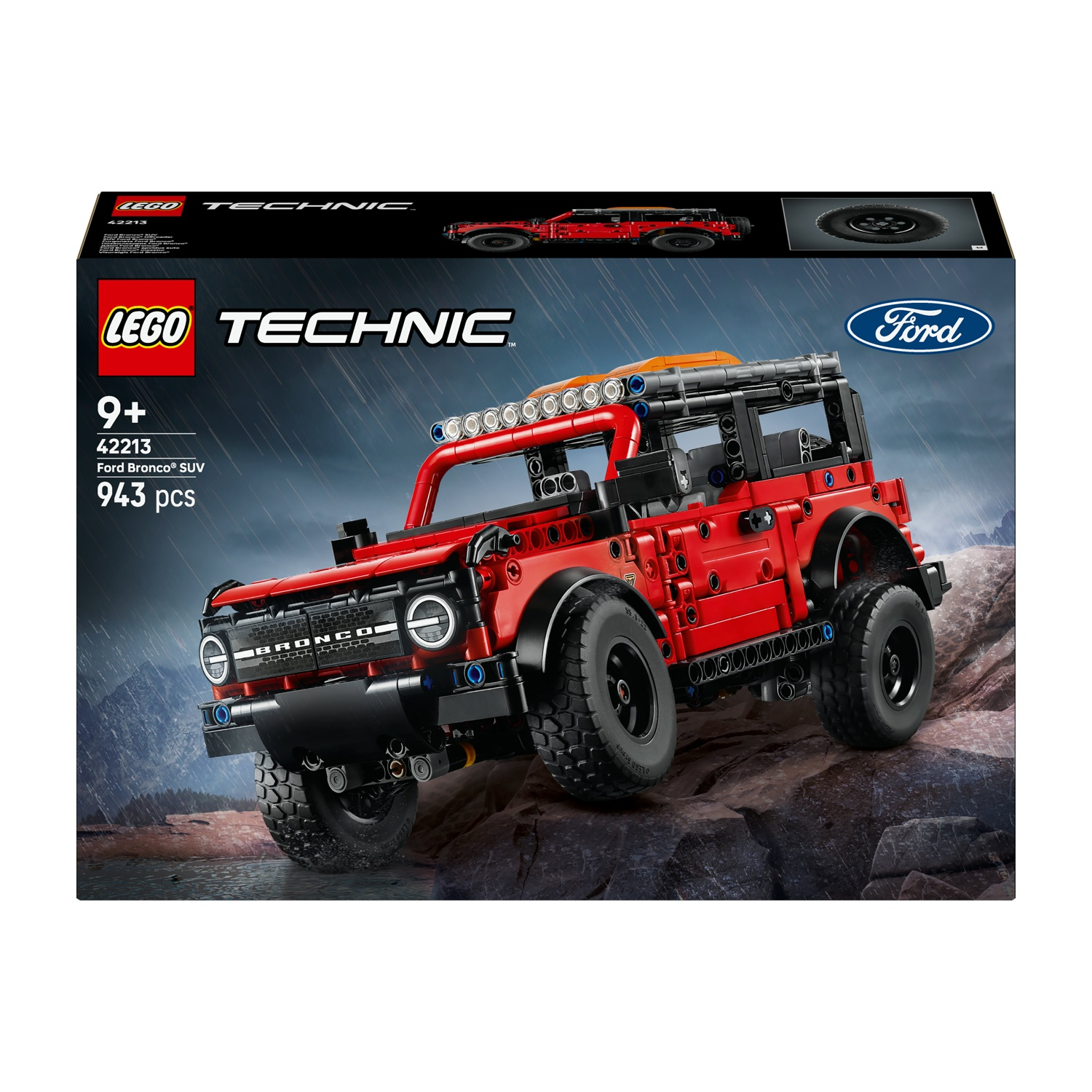 Modello rosso LEGO Technic Ford Bronco SUV su terreno roccioso con pioggia.