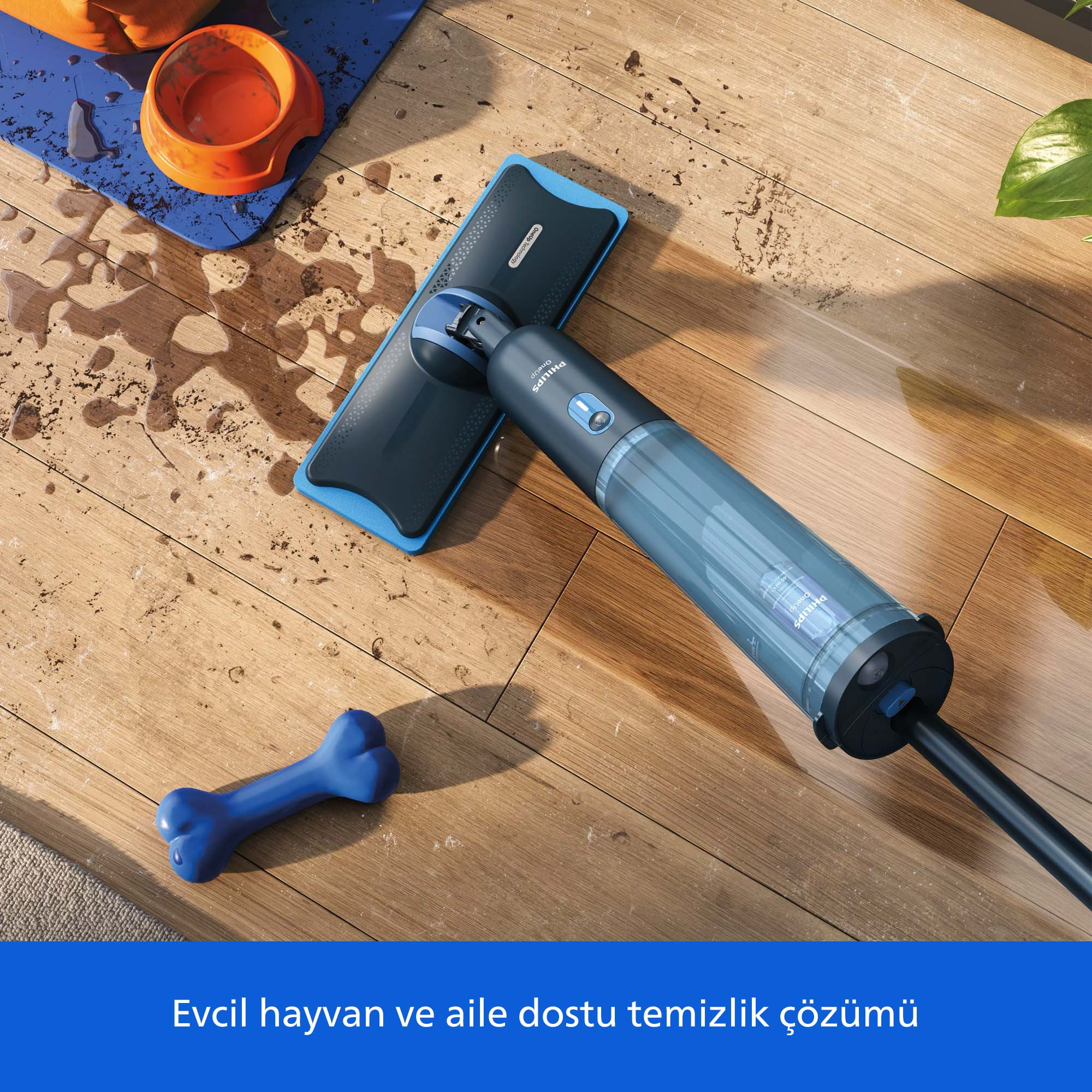 Mavi kemik, mama kabı ve ahşap zeminde elektrikli süpürge.