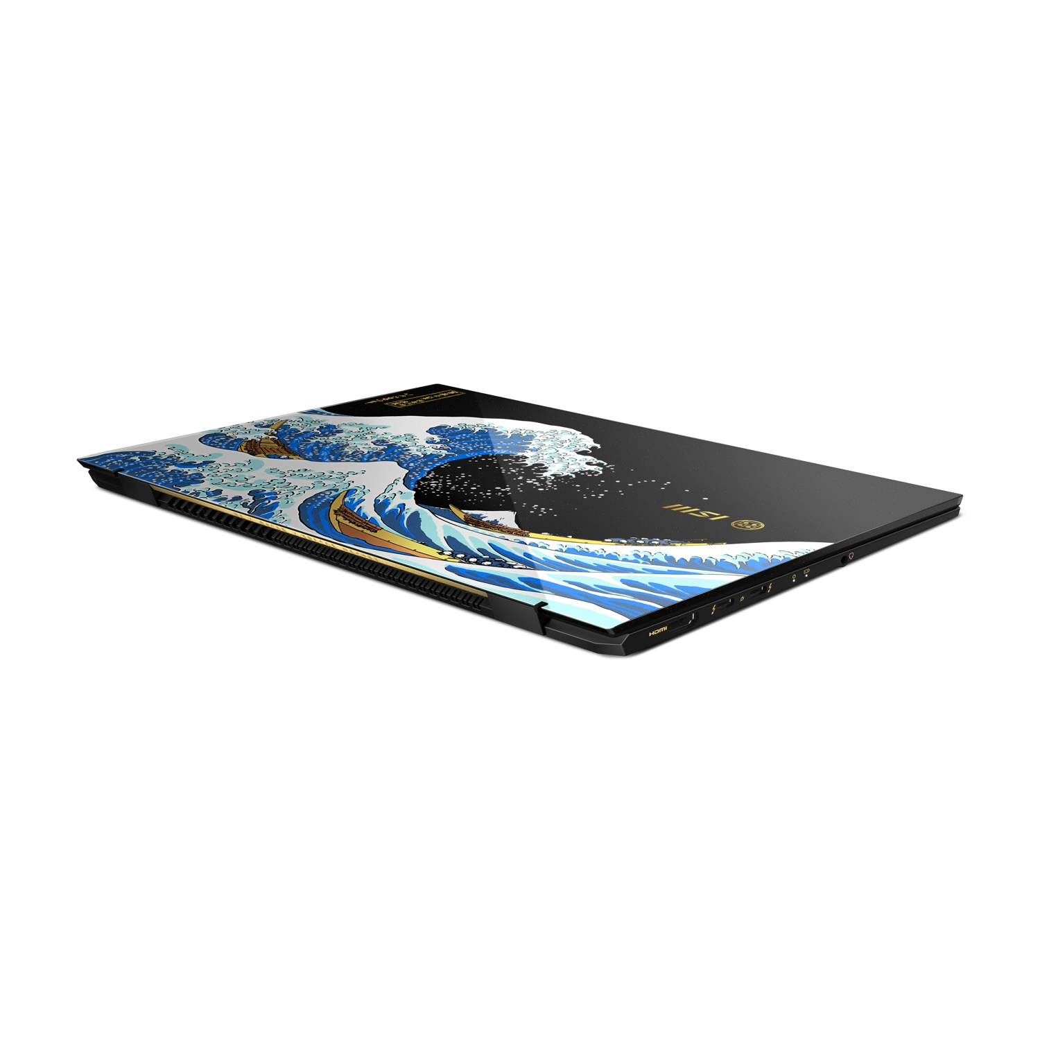 Un laptop nero con l'opera La grande onda di Kanagawa sul coperchio.