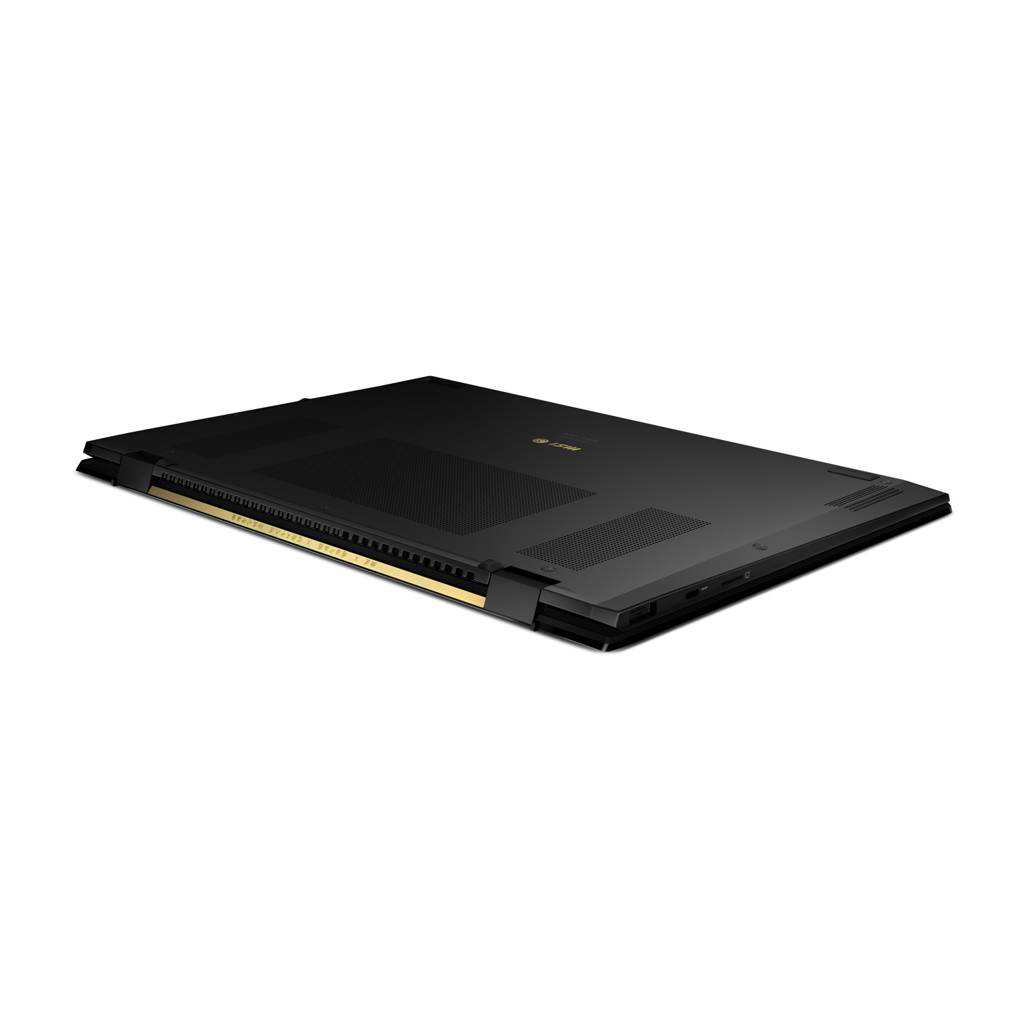 Laptop nero chiuso con accenti dorati e griglie di ventilazione.