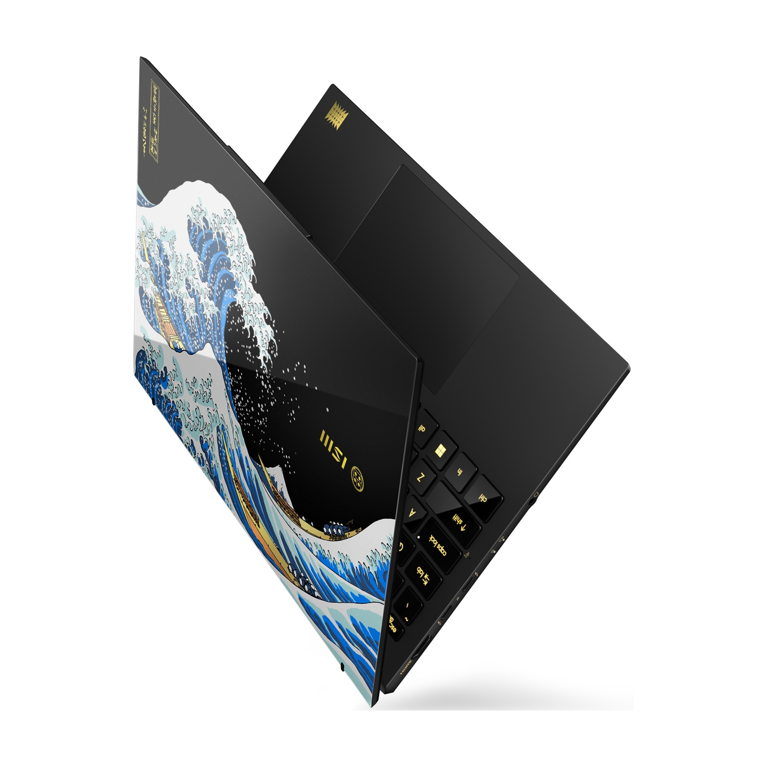 Laptop nero con design "La grande onda di Kanagawa" sul coperchio.