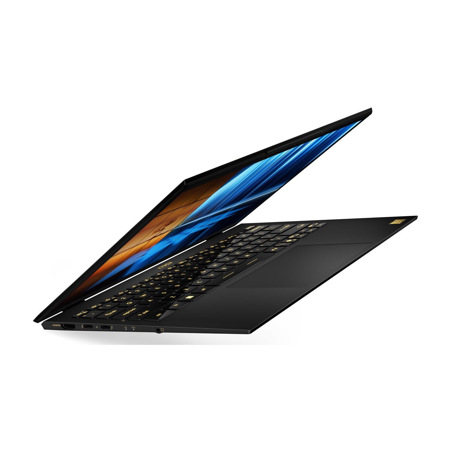 Laptop nero con tastiera dorata illuminata, aperto, con sfondo astratto.