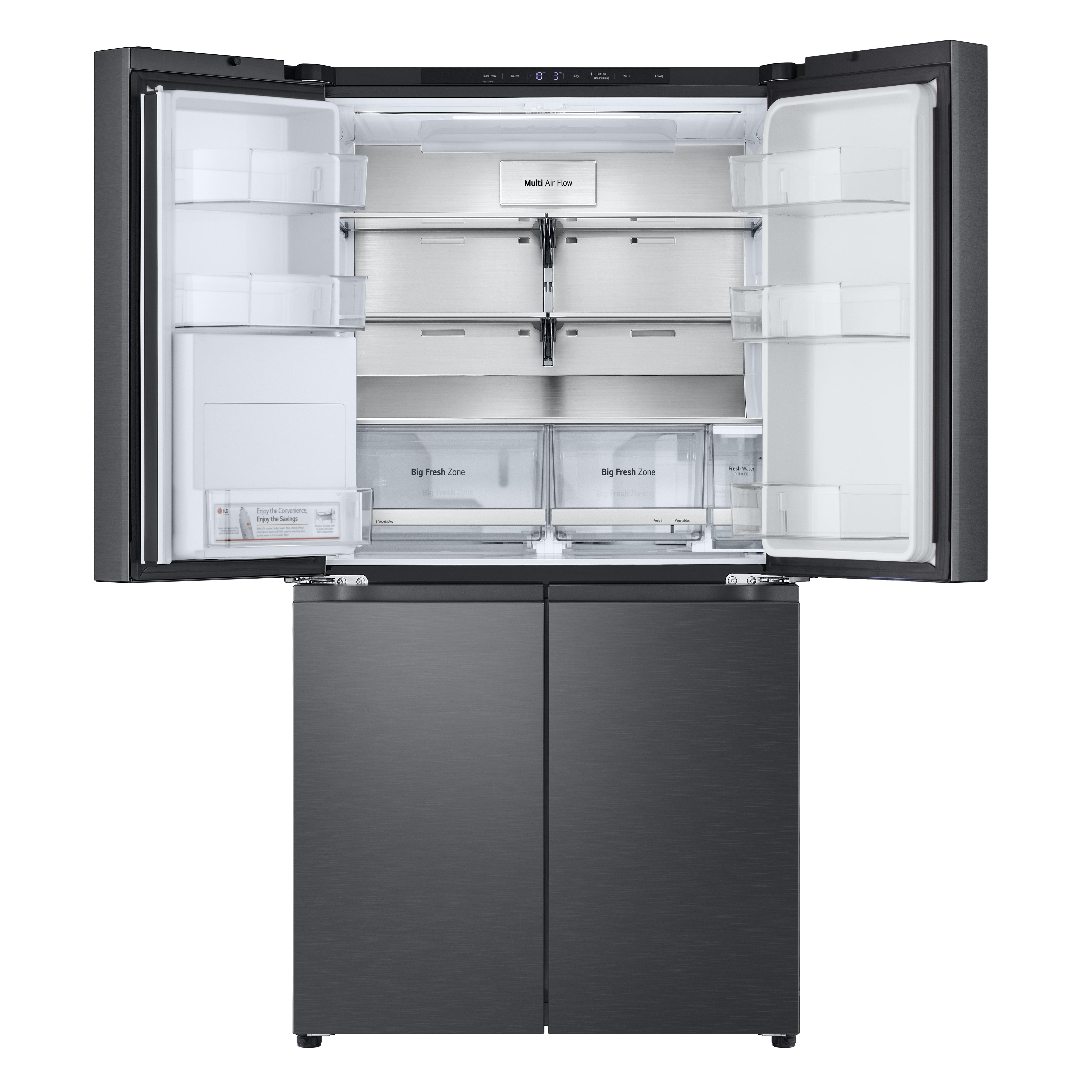 Ein offener, dunkler Kühlschrank mit vier Türen, Regalen und Schubladen.