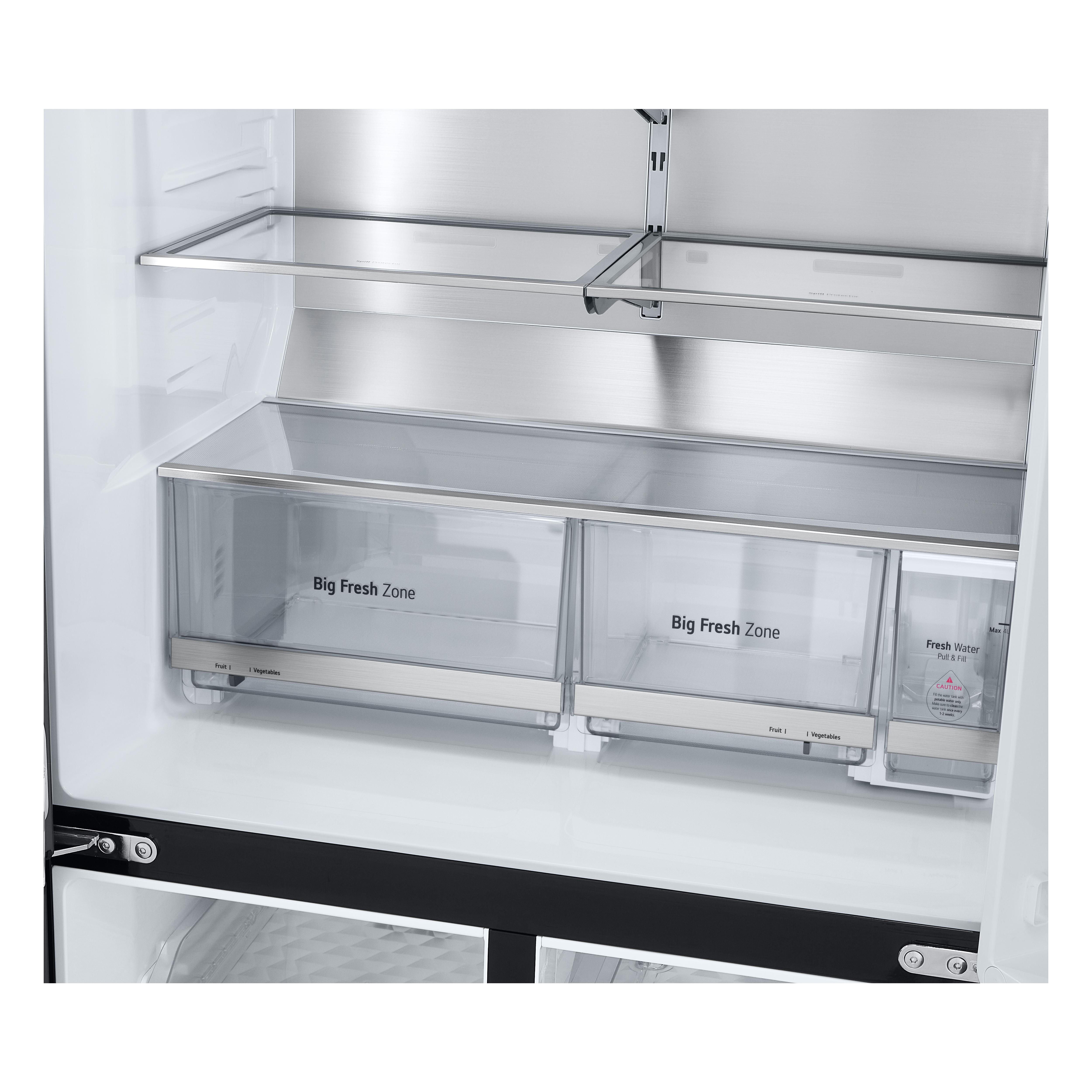 Ein leerer Kühlschrank mit zwei "Big Fresh Zone"-Schubladen und einem Frischwasserbehälter.