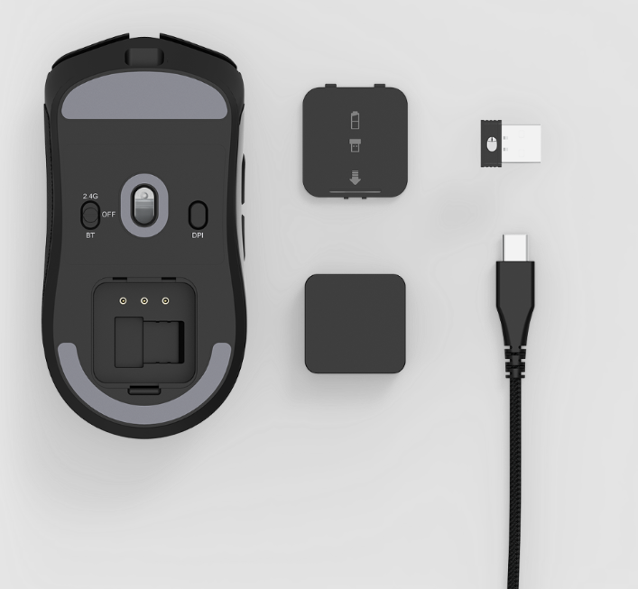 Schwarze Maus mit Zubehör: USB-Empfänger, Kabel, Ersatzteil.