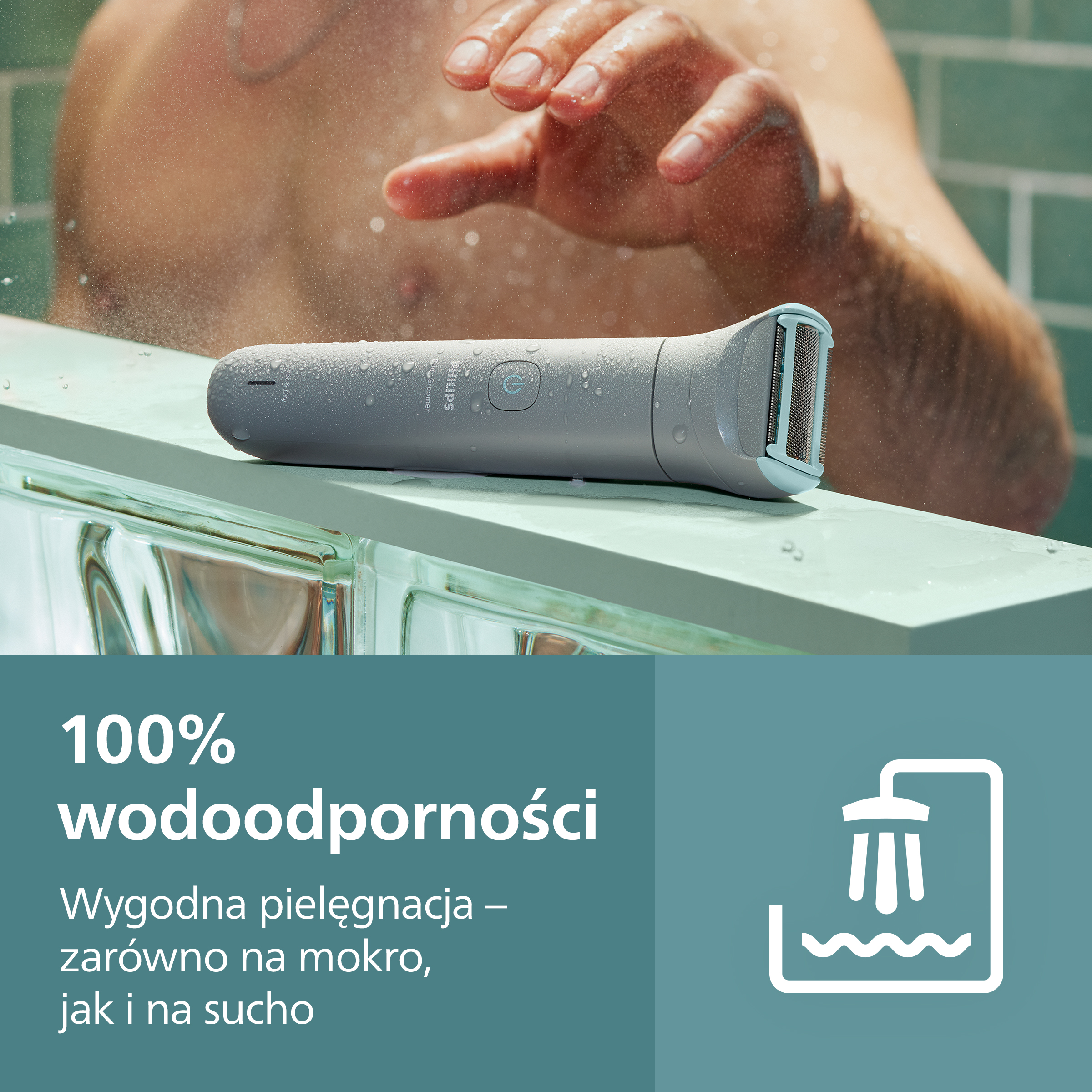 Mokry, szary trymer do ciała Philips leży na półce.