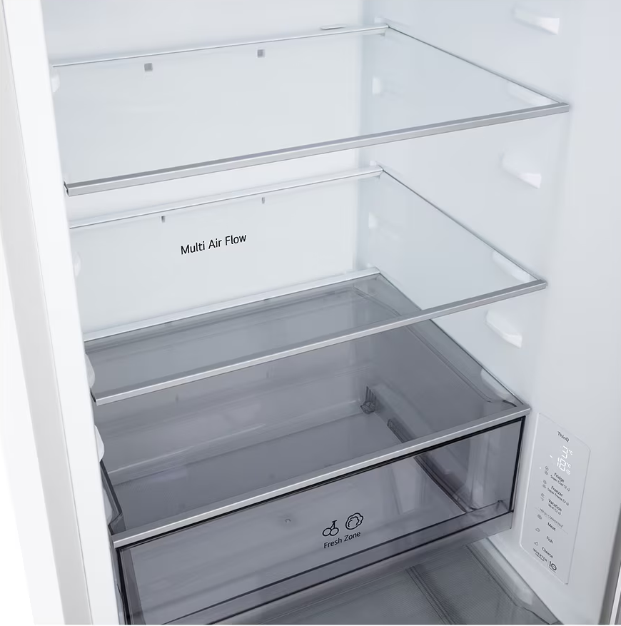 Egy fehér hűtőszekrény belseje üvegpolcokkal és "Fresh Zone" fiókkal.