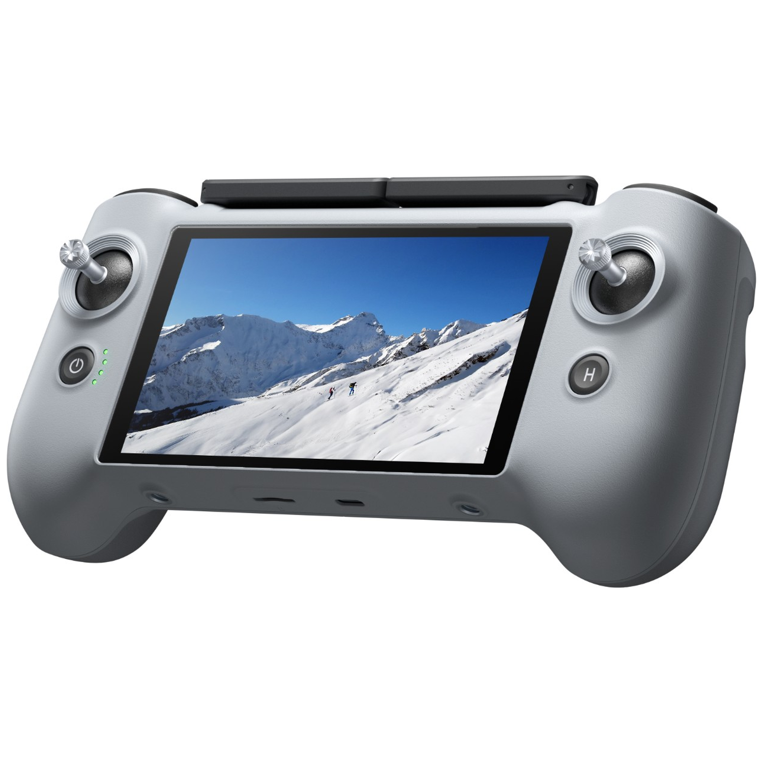 Grijze controller met scherm dat besneeuwde bergen en skiërs toont.