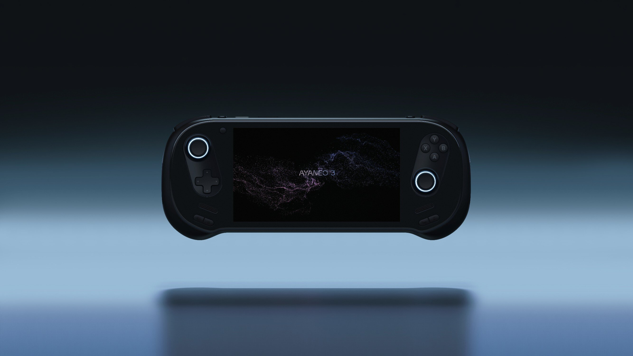 Czarny przenośny gadżet do gier unosi się na ciemnym tle.