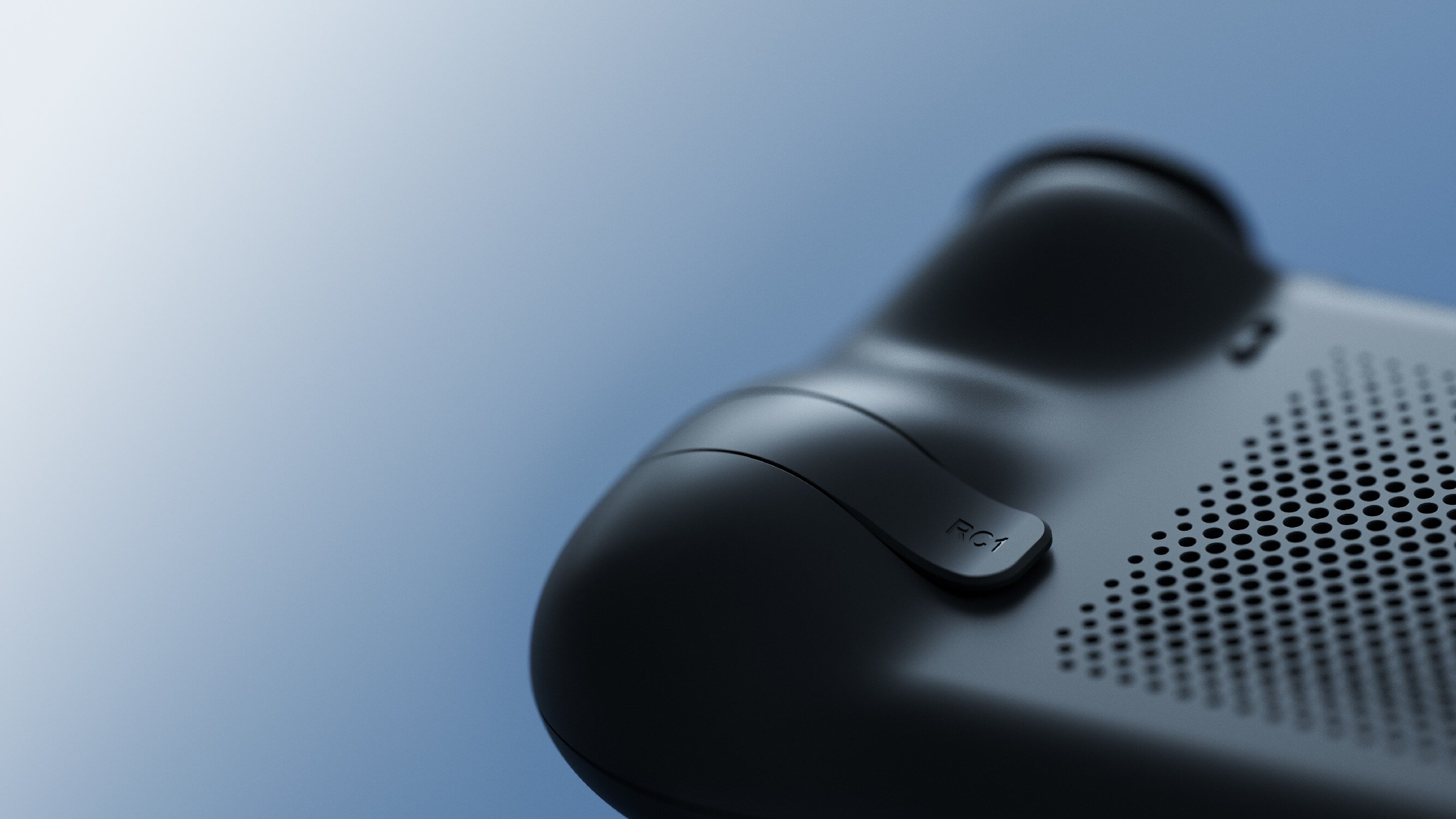 Ciemny kontroler z oznaczeniem RC1 i wzorem otworów.