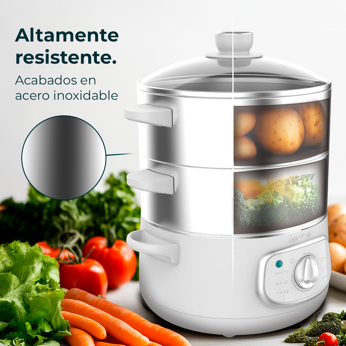 Una vaporera eléctrica blanca de dos niveles, con patatas y brócoli dentro. Verduras frescas la rodean.