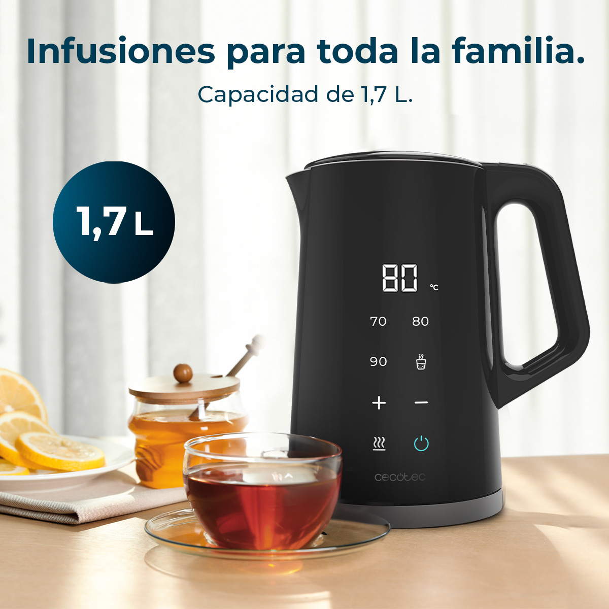 Hervidor eléctrico negro de 1,7 L con pantalla a 80°C, junto a té, limón y miel.