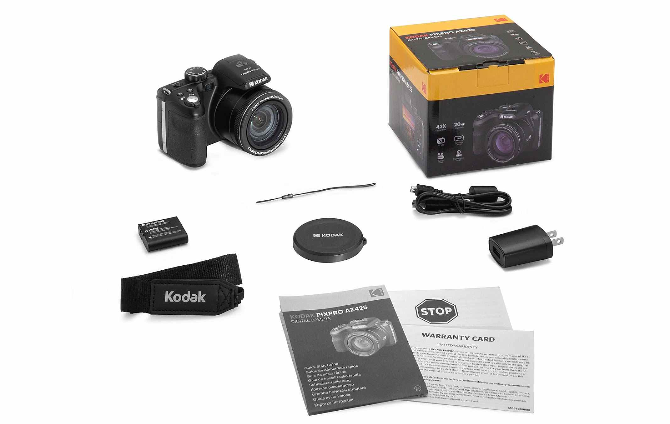 Appareil photo Kodak Pixpro AZ425 avec accessoires : batterie, sangle, bouchon d'objectif, câbles, adaptateur, manuel.