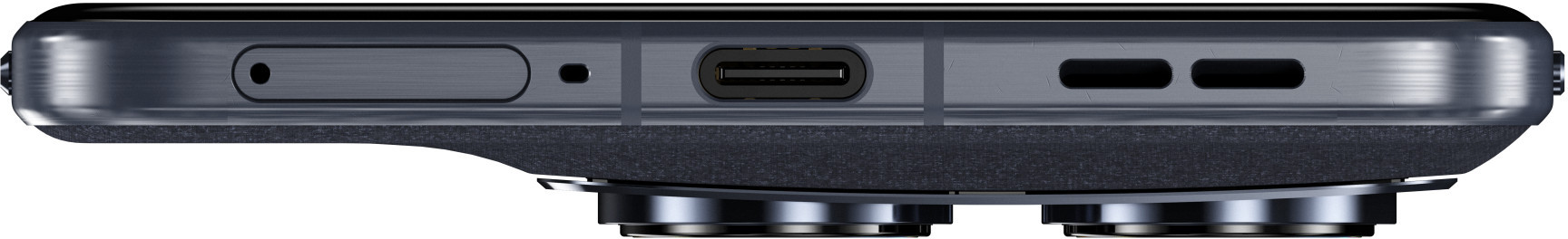 Zbliżenie dolnej krawędzi ciemnego telefonu z portem USB-C, grillami głośników i tacką SIM.