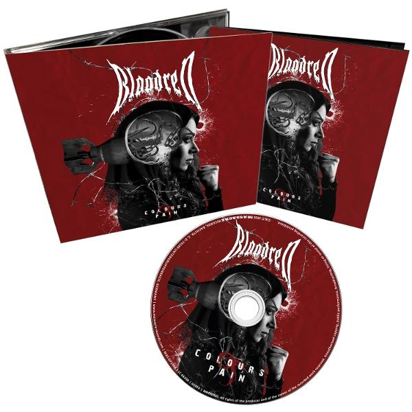 CD-Hülle und CD mit Bandlogo, Frau und Bombe auf rotem Hintergrund.