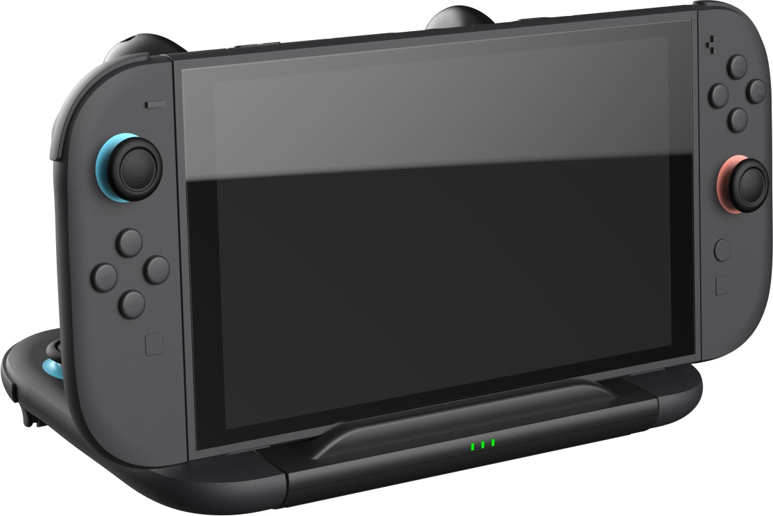 Appareil portable noir avec joysticks et boutons, sur une station de charge avec lumières vertes.