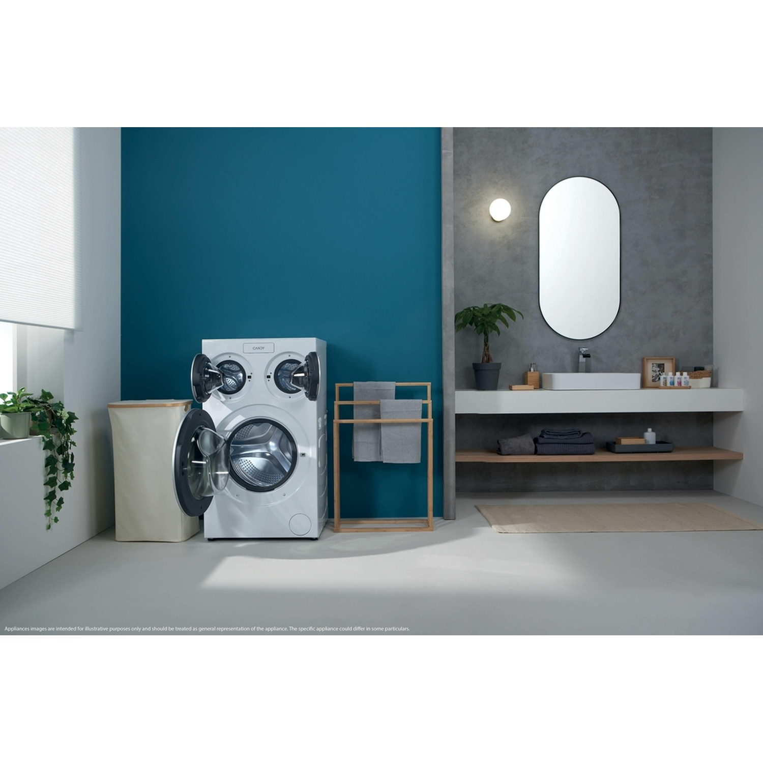 Un bagno con lavatrice, cesto per biancheria, specchio e lavandino.