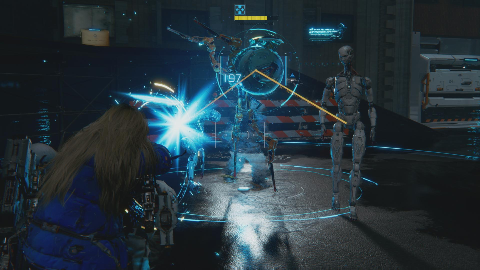 Ein Spieler in blauer Rüstung feuert auf einen Roboter. Ein anderer Roboter steht im Hintergrund.