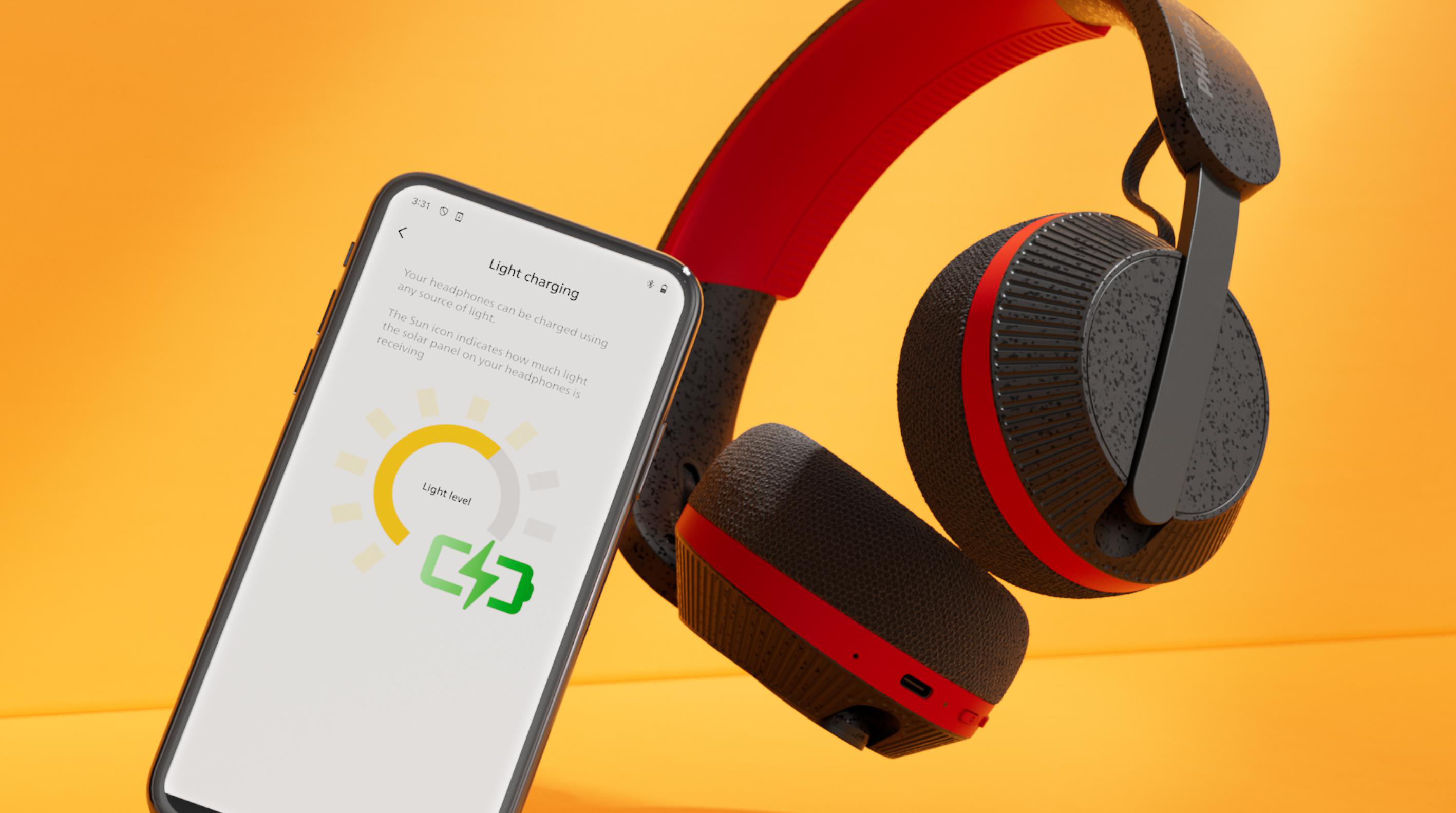 Kopfhörer mit roter und schwarzer
Akzentuierung neben einem Smartphone.