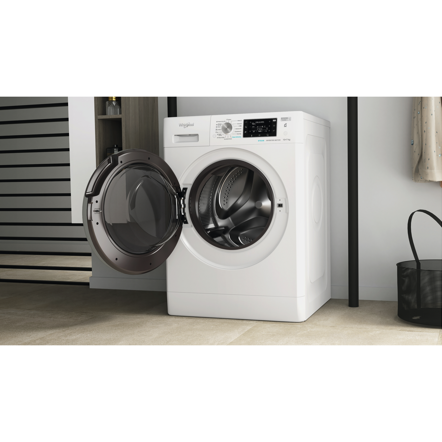 A white washing machine with an open door stands on a light-colored floor.