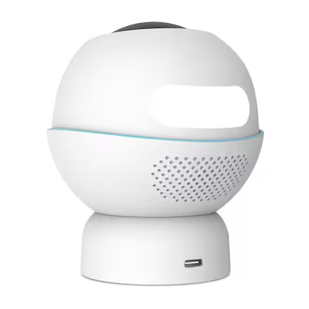 Un altavoz blanco y esférico con banda azul y puerto USB.