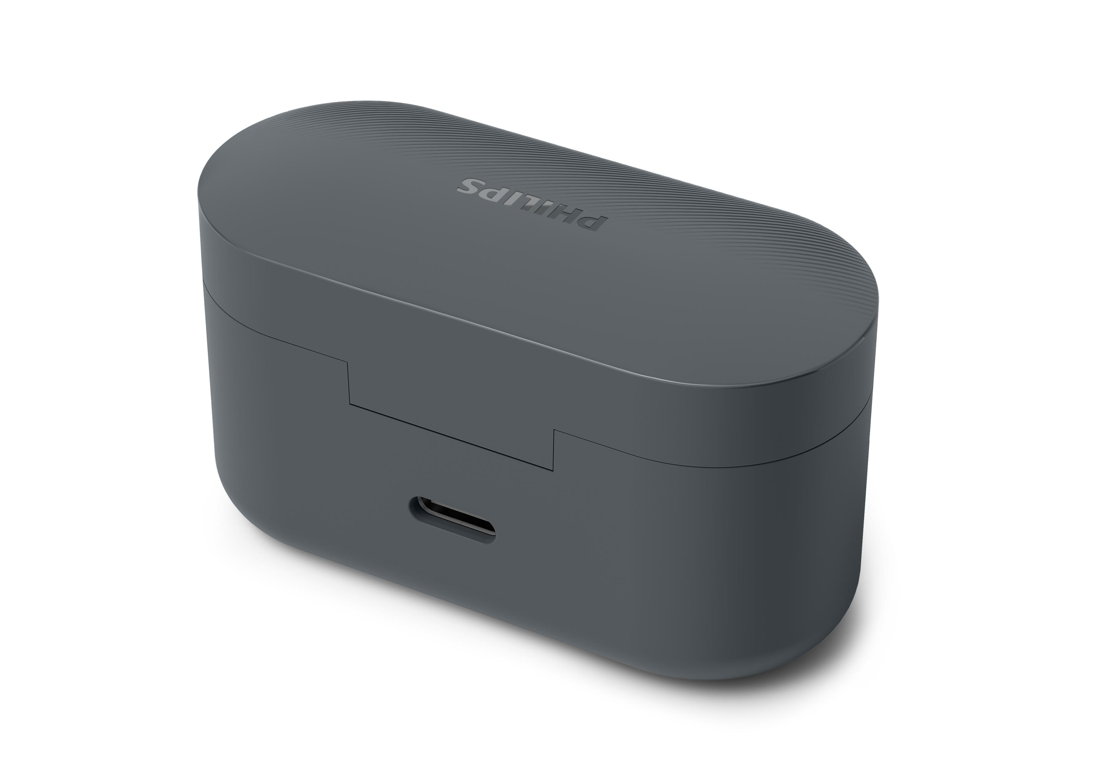 Eine graue Ladebox mit gerilltem Deckel und USB-C-Anschluss.