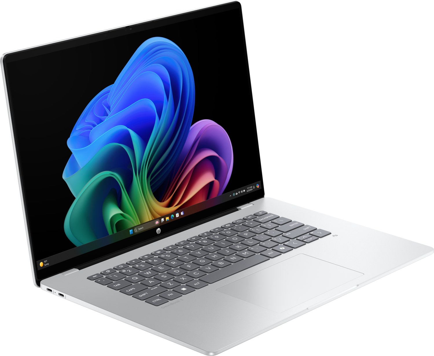An open silver laptop displaying a colorful abstract wallpaper and keyboard.