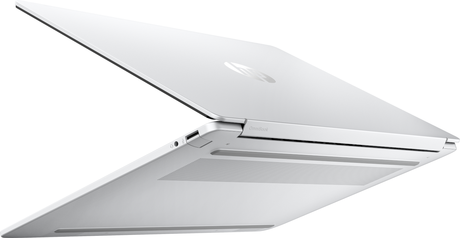 A white HP Omnibook laptop with its lid open, showing the underside and ports.
