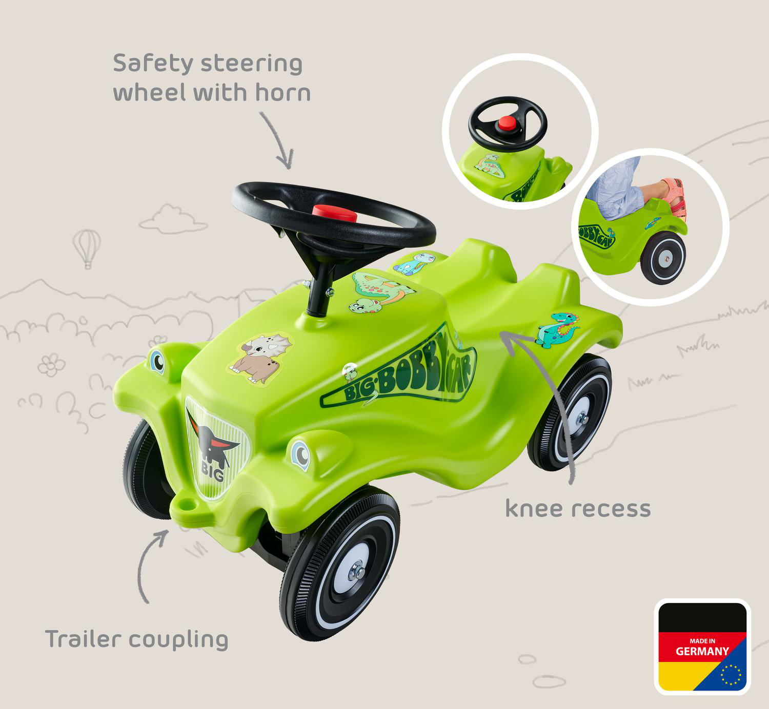 Grünes Bobby Car mit Lenkrad, Aufklebern und Anhängerkupplung.