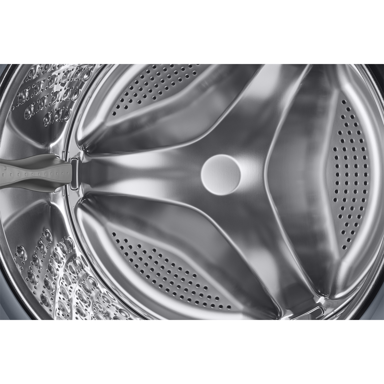 Interior view of a metal washing machine drum with a loading door and hole pattern.