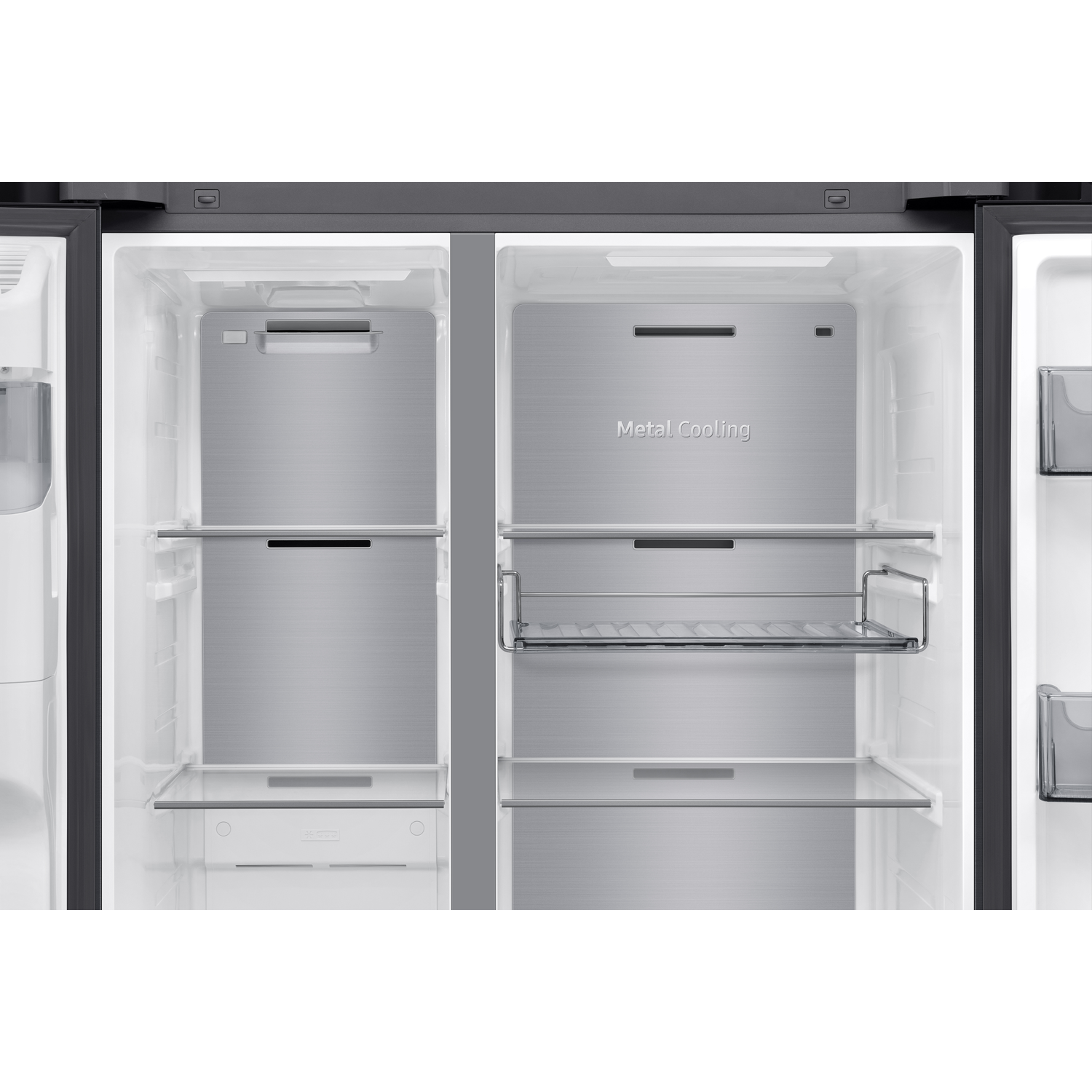 Empty interior of a modern refrigerator with metal shelves and drawers.