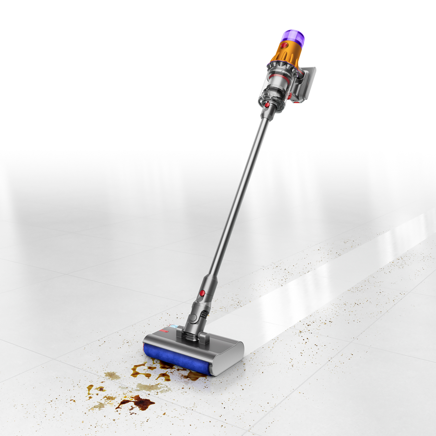 A cordless vacuum cleaner cleans spills on a white tiled floor.