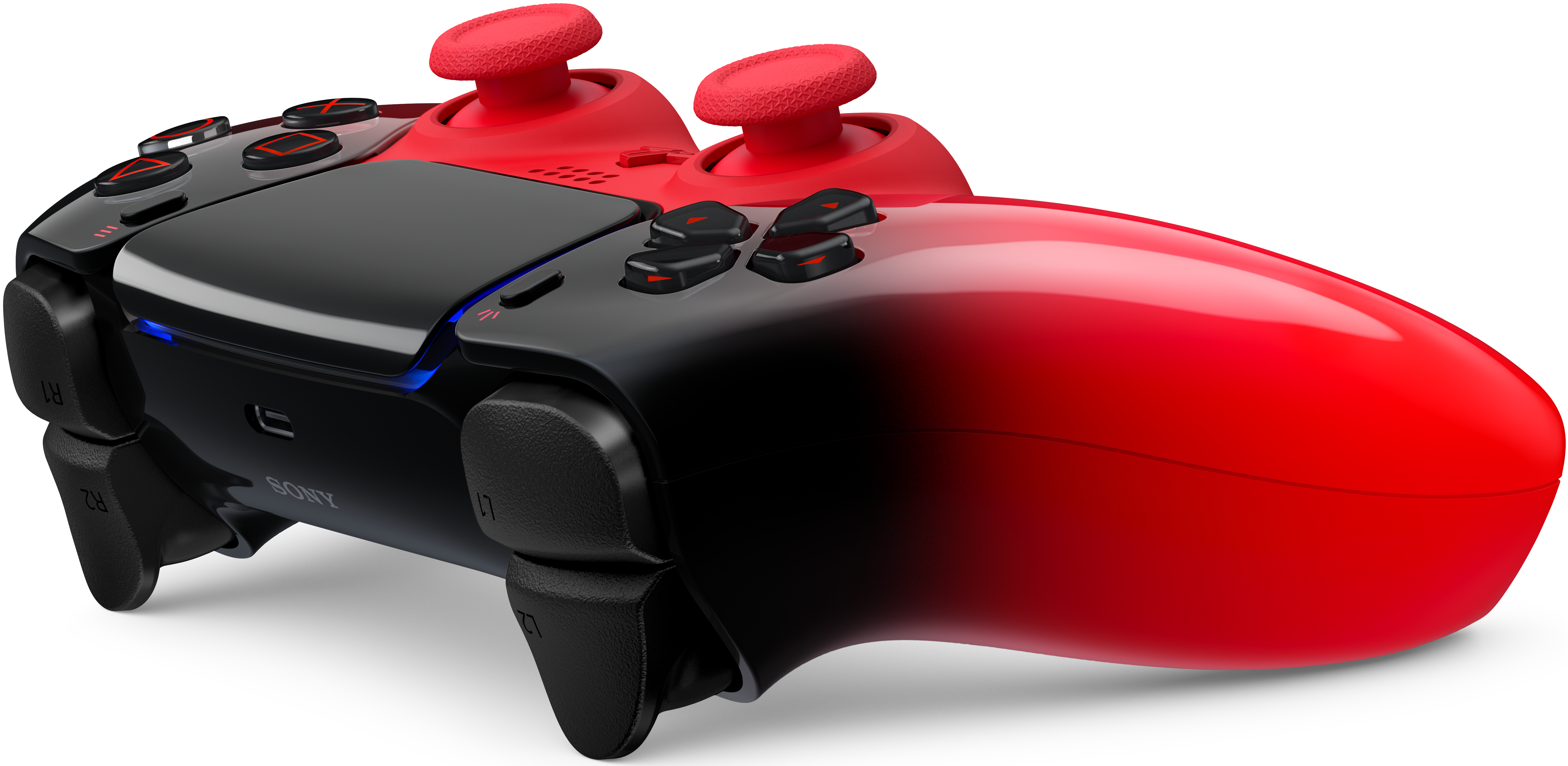 Ein roter und schwarzer Controller mit zwei Joysticks und Knöpfen.