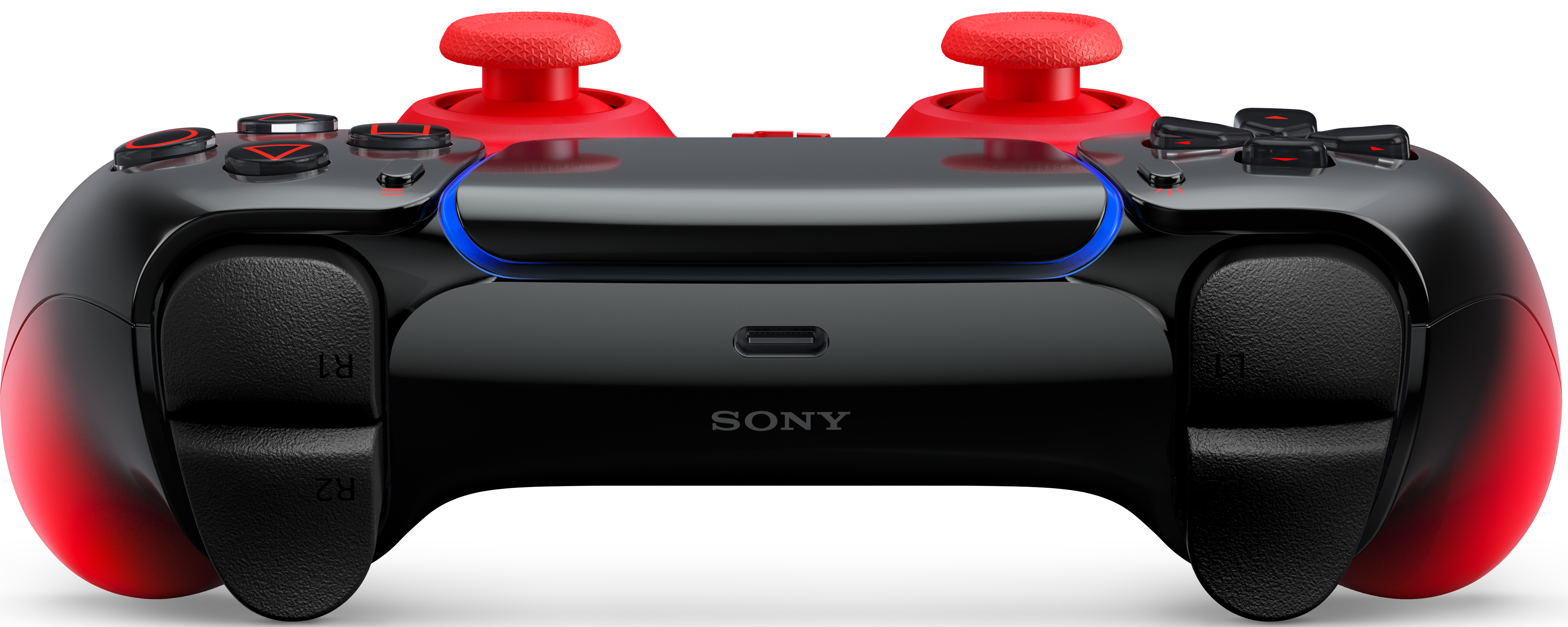 Schwarzer Controller mit roten Akzenten, beleuchteten Tasten und Joysticks.