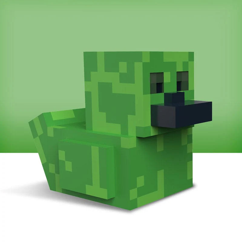 Zöld, Minecraft-stílusú kacsa sötét csőrrel, világos háttér előtt.