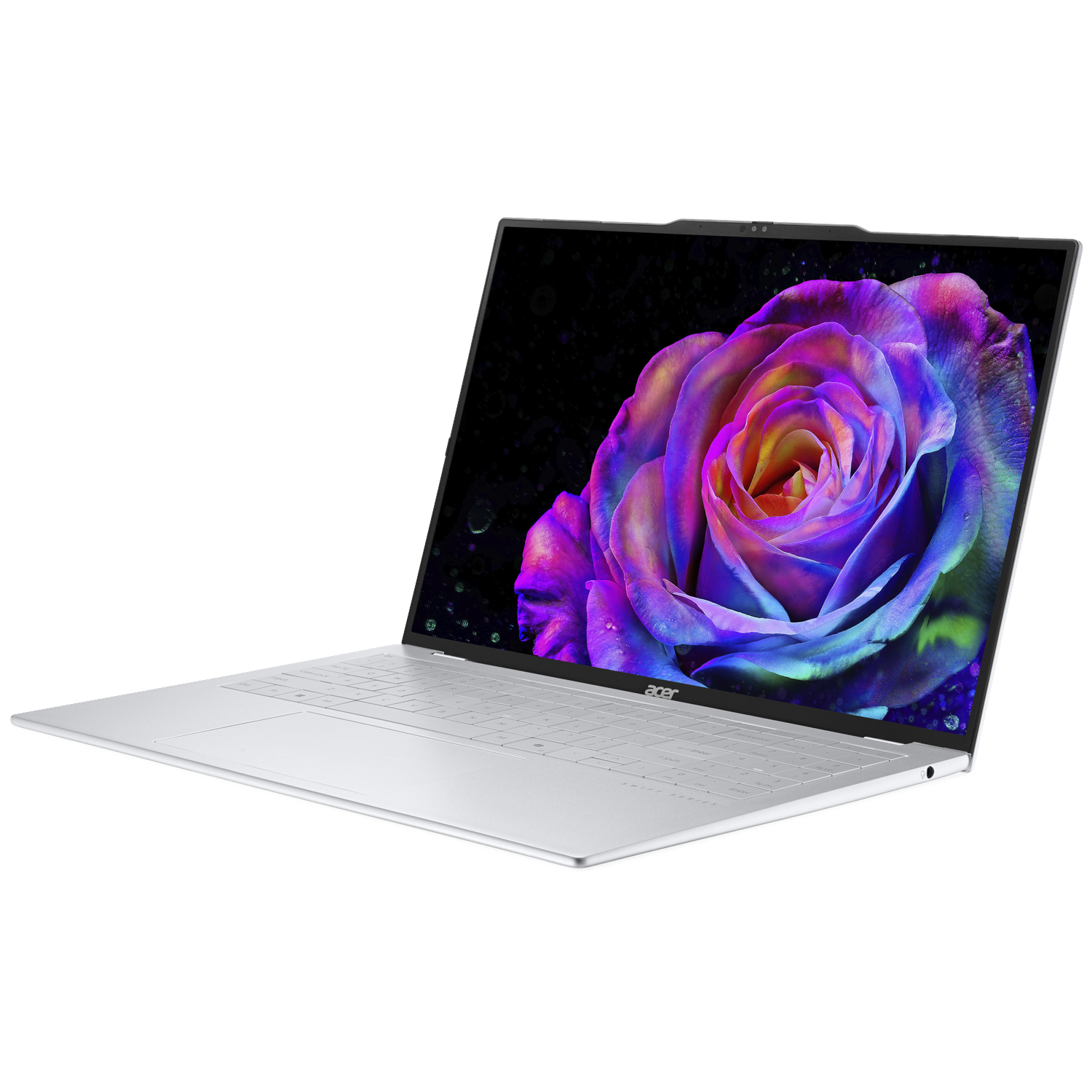 Een open zilveren laptop met een kleurrijke roos-achtergrond op het scherm.