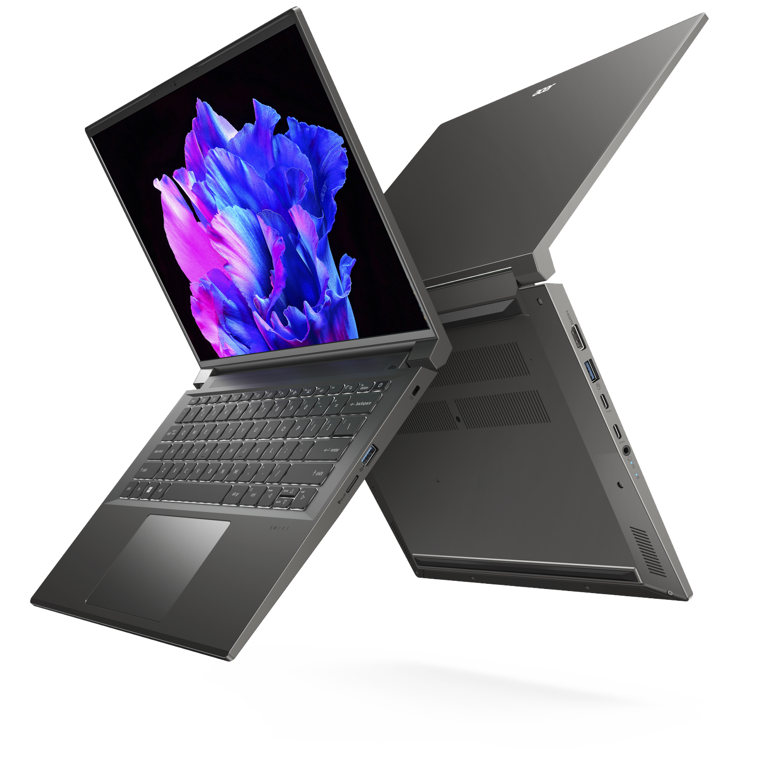 An open grey laptop displaying a blue and purple flower on its screen.