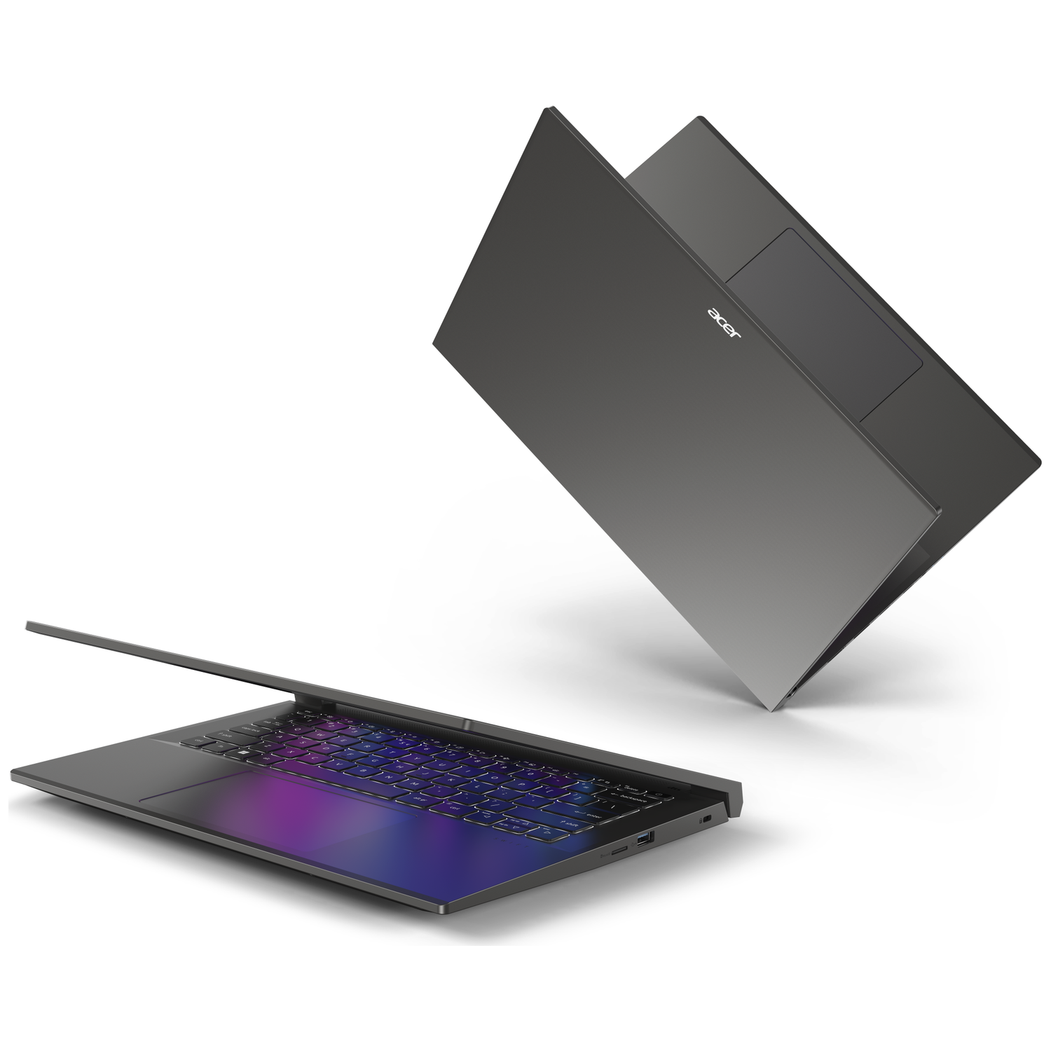 Two gray laptops on a white background. One is open, the other is closed.