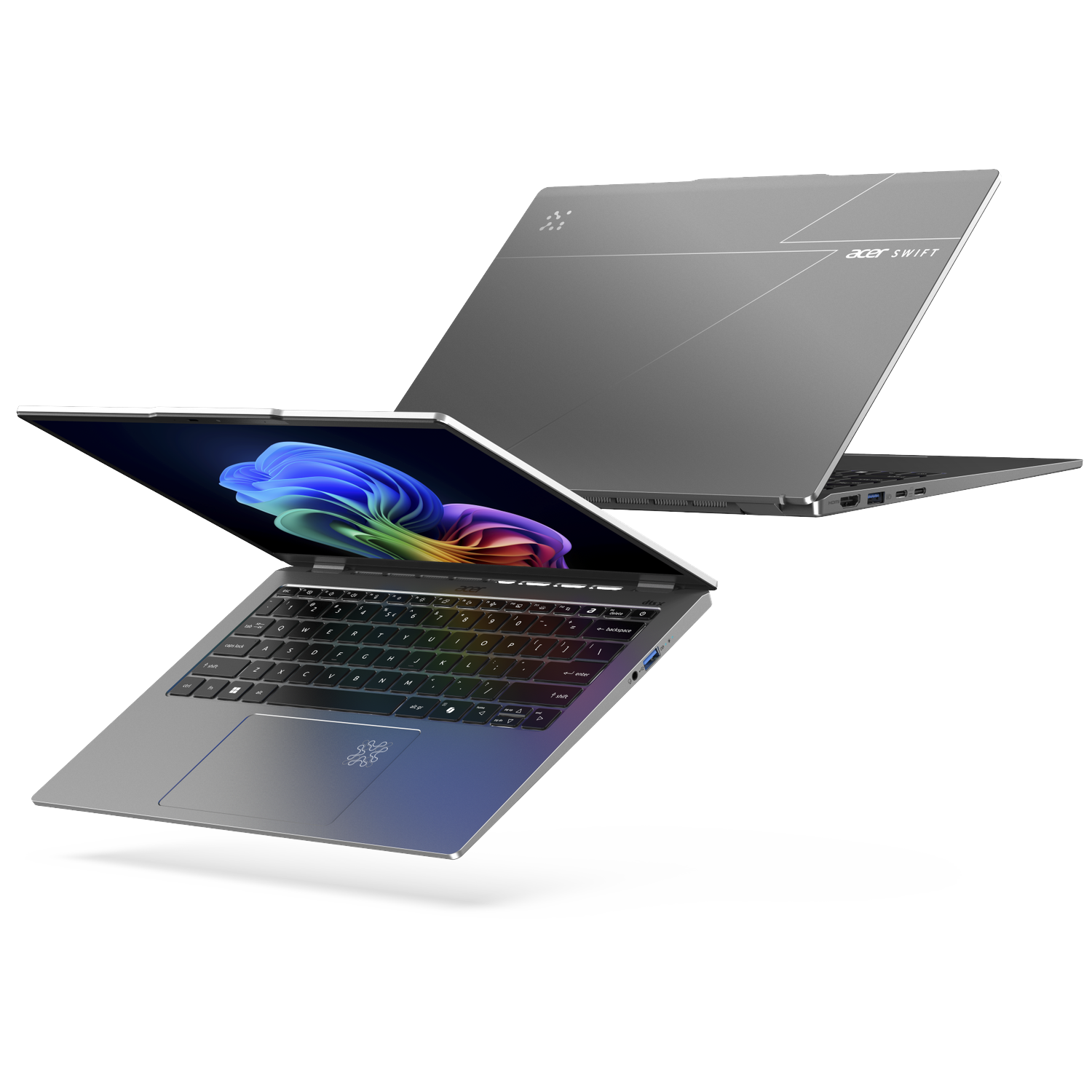 Two silver Acer Swift laptops, one open showing a colorful screen, the other closed.