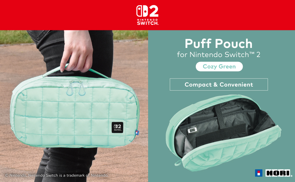 Eine Person hält eine hellgrüne gepolsterte Nintendo Switch Tasche.